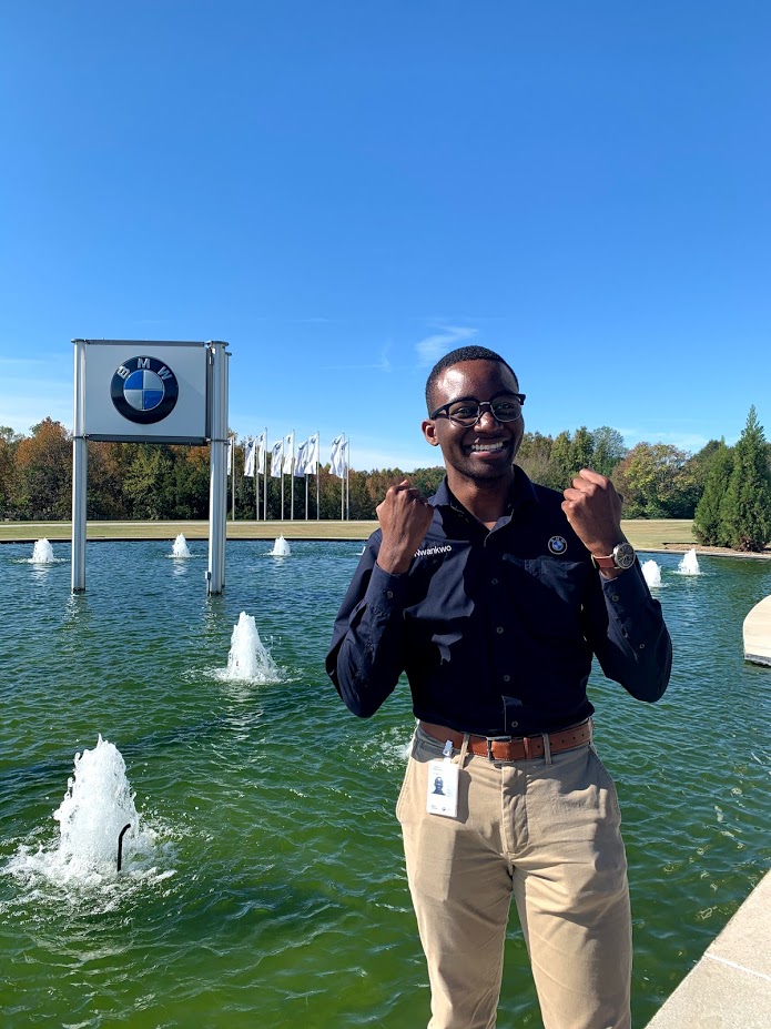 pic of josh in front of bmw logo